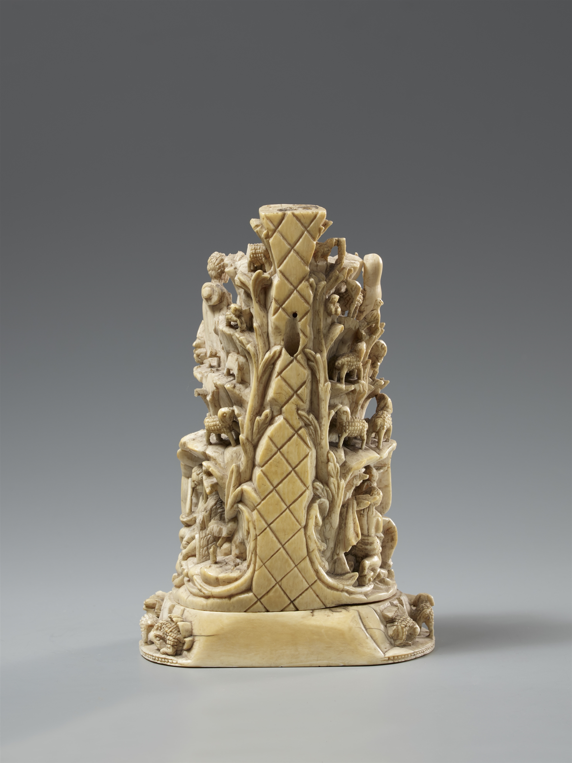 An Indo-Portuguese ivory mountain socle of the Christ Child as the Good Shepherd. India, Goa. Ca. 16 - Image 2 of 2