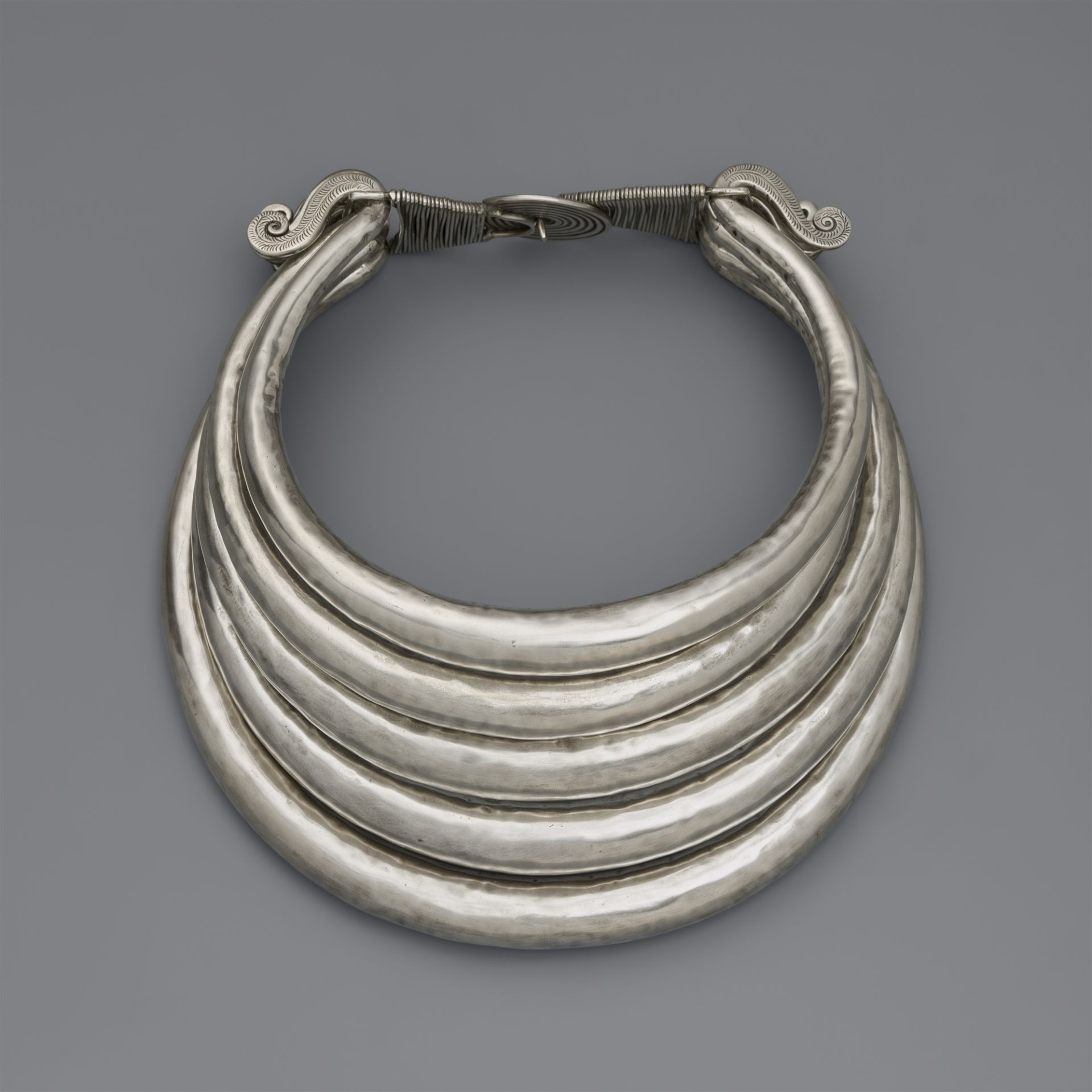 A silver neck ornament. Southern China, Northern Thailand, Burma, Laos or Vietnam. Miao, Hmong and Y