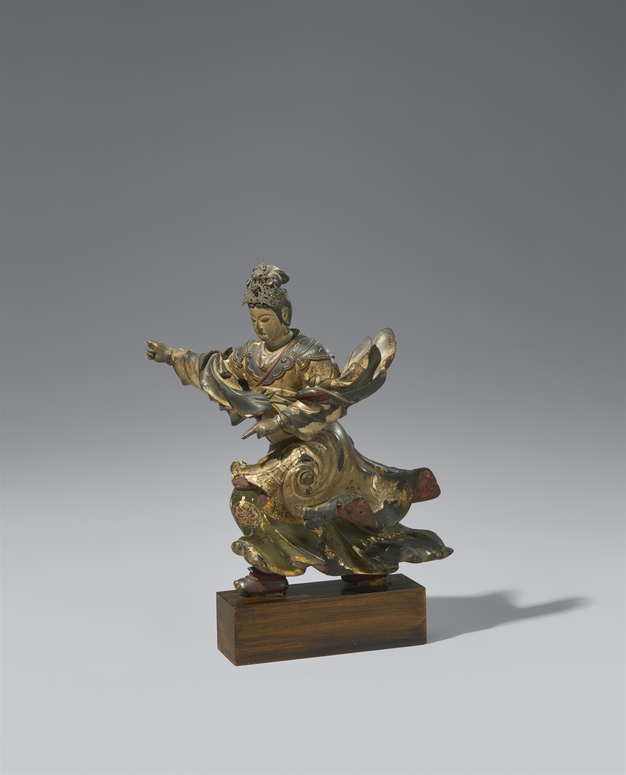 A polychromed wood Buddhist figure. Late 17thth/18th century
