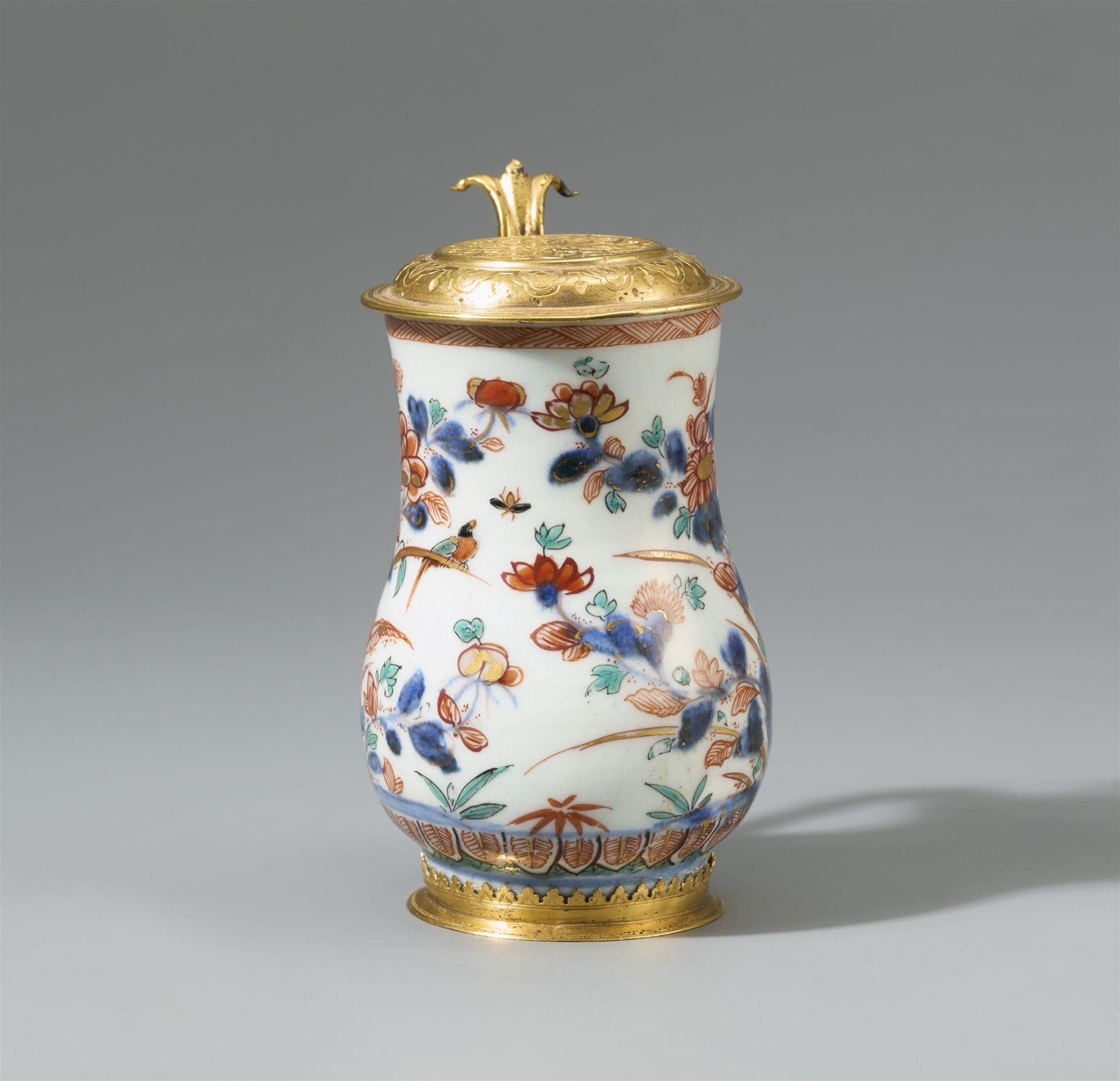 A small mounted pear-shaped Imari jug. Arita. Around 1720