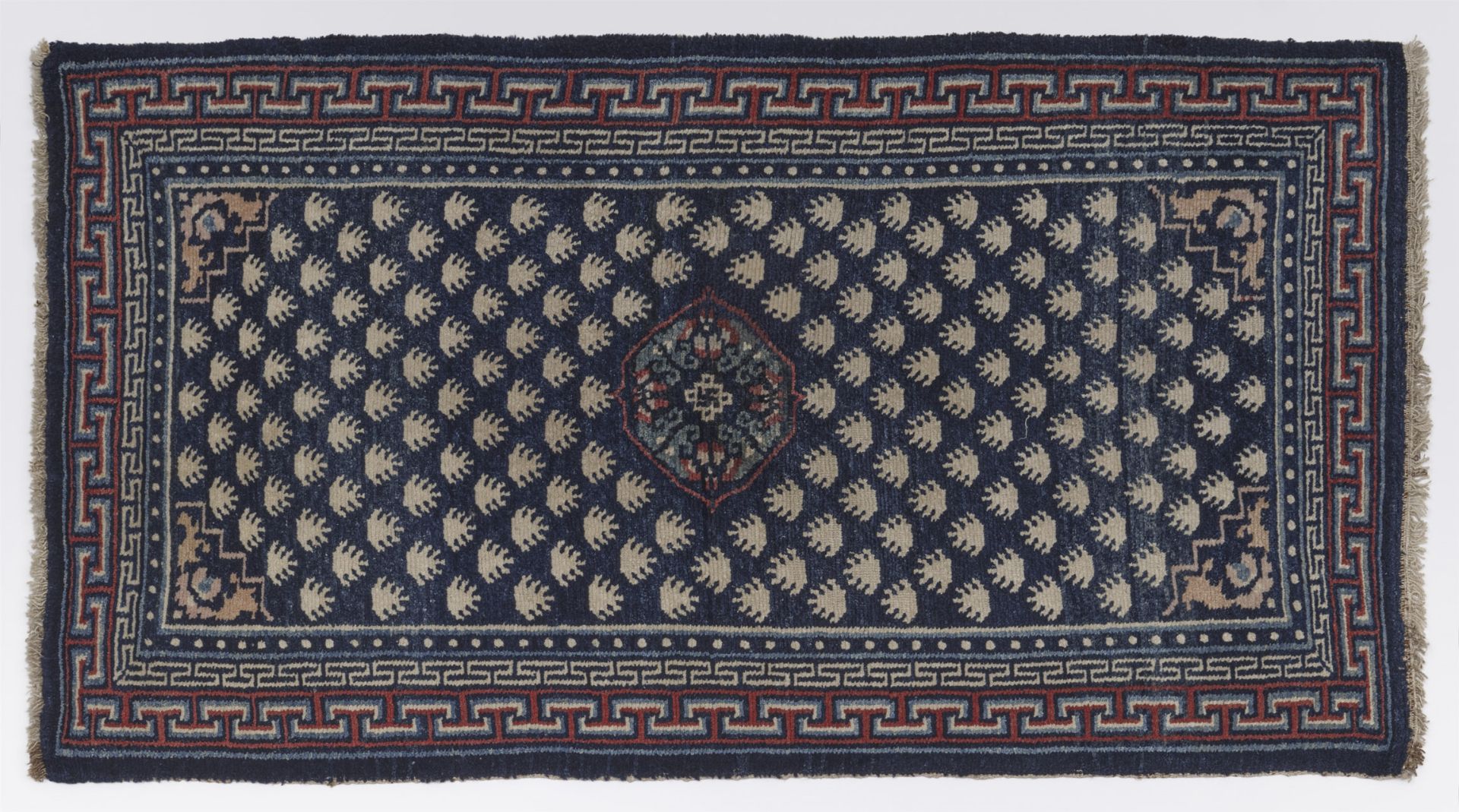 A wool khaden rug. Tibet, Kampa Dzong, 19th century