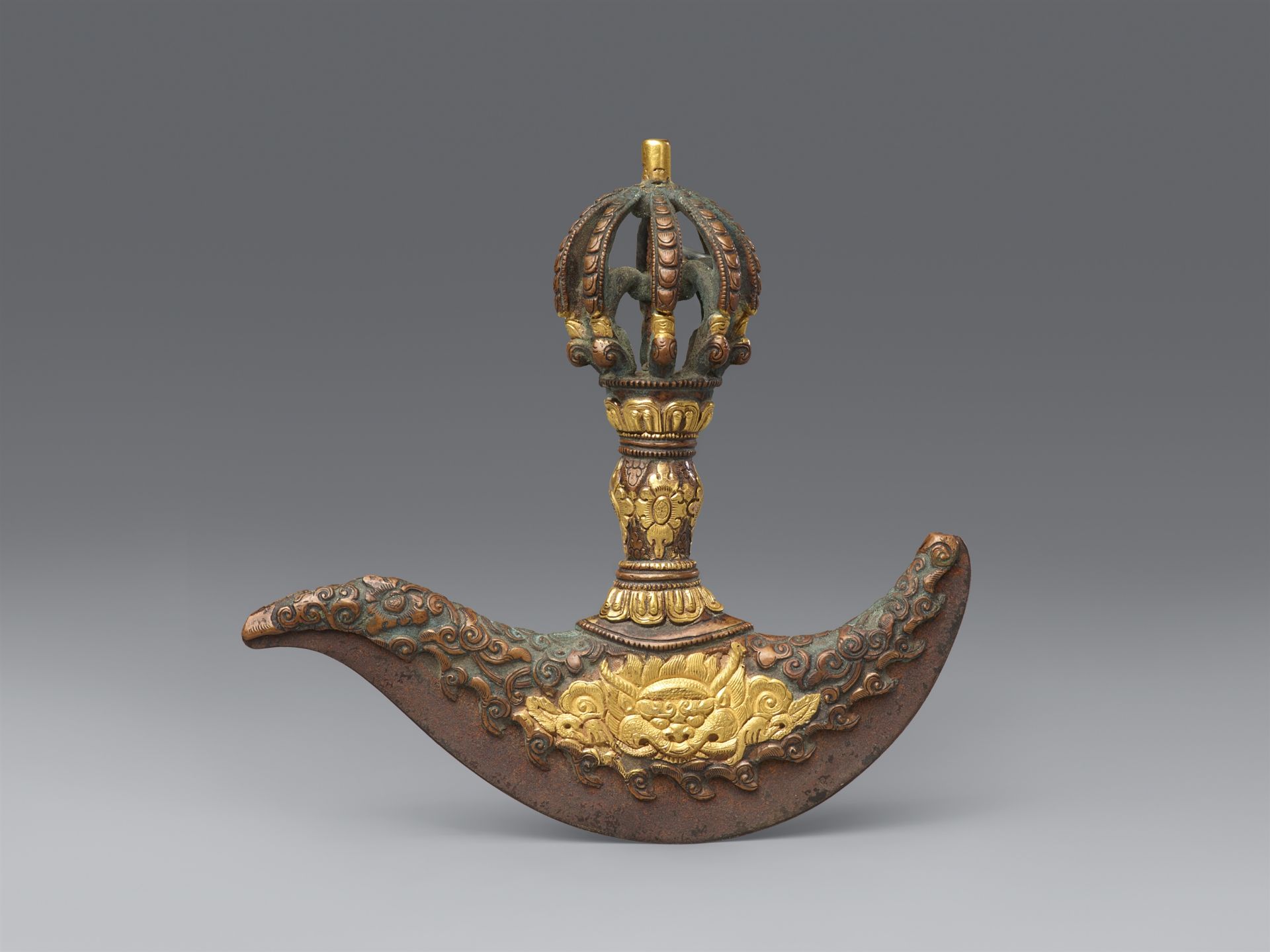 A chopper knife (kartrika). Iron with gilt copper overlays. Tibet, 18th/19th century