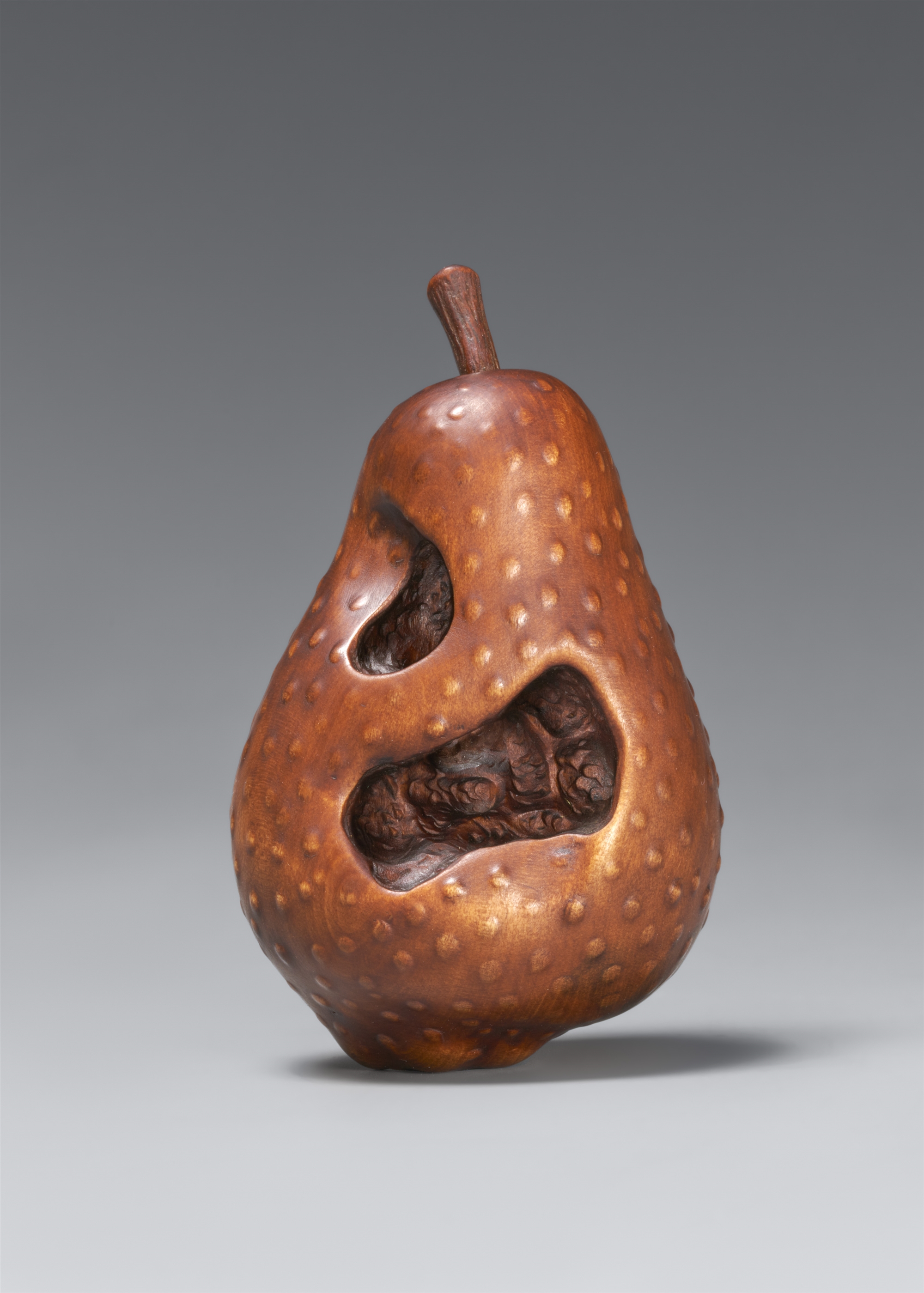 A wood netsuke of a wasp in rotting pear. In the style of Sangetsu. Nagoya. Second half 19th century - Image 2 of 5