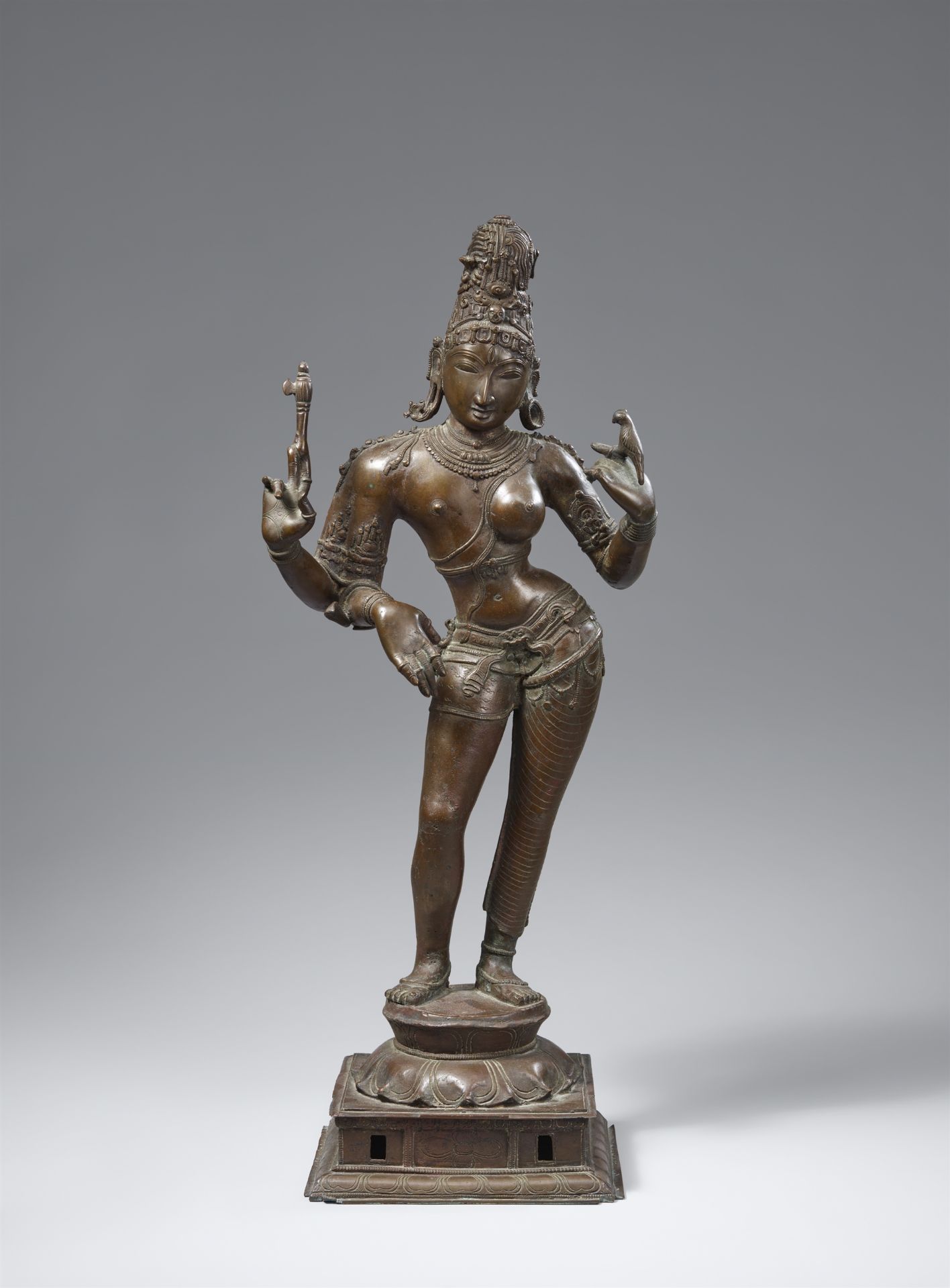 A bronze processional figure of Ardhanarishvara. Southern India. In the style of the Chola period, p