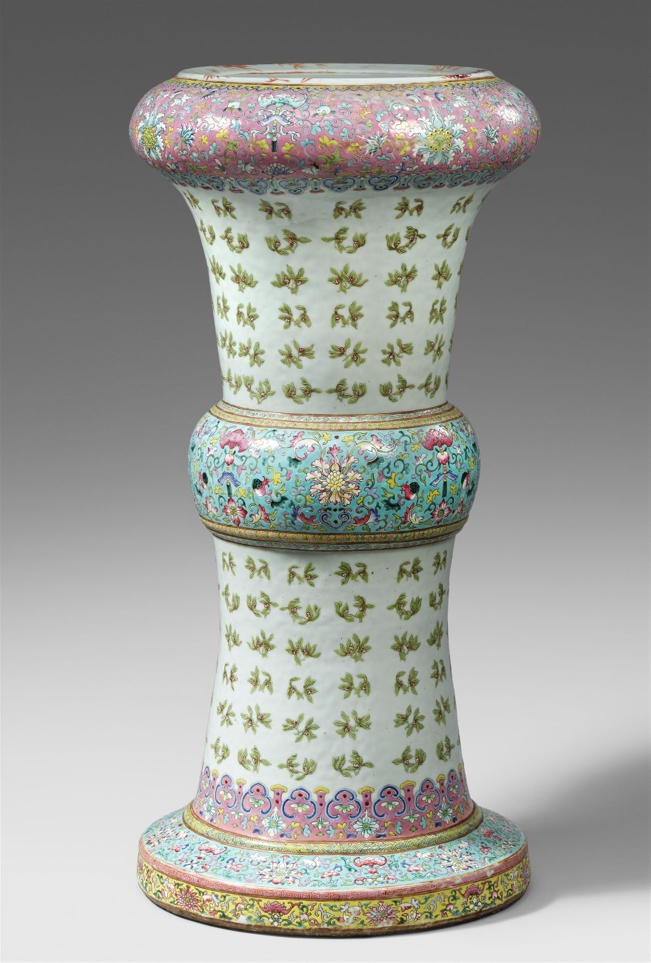 A famille rose pedestal stand for a jardiniere. Late Qing dynasty