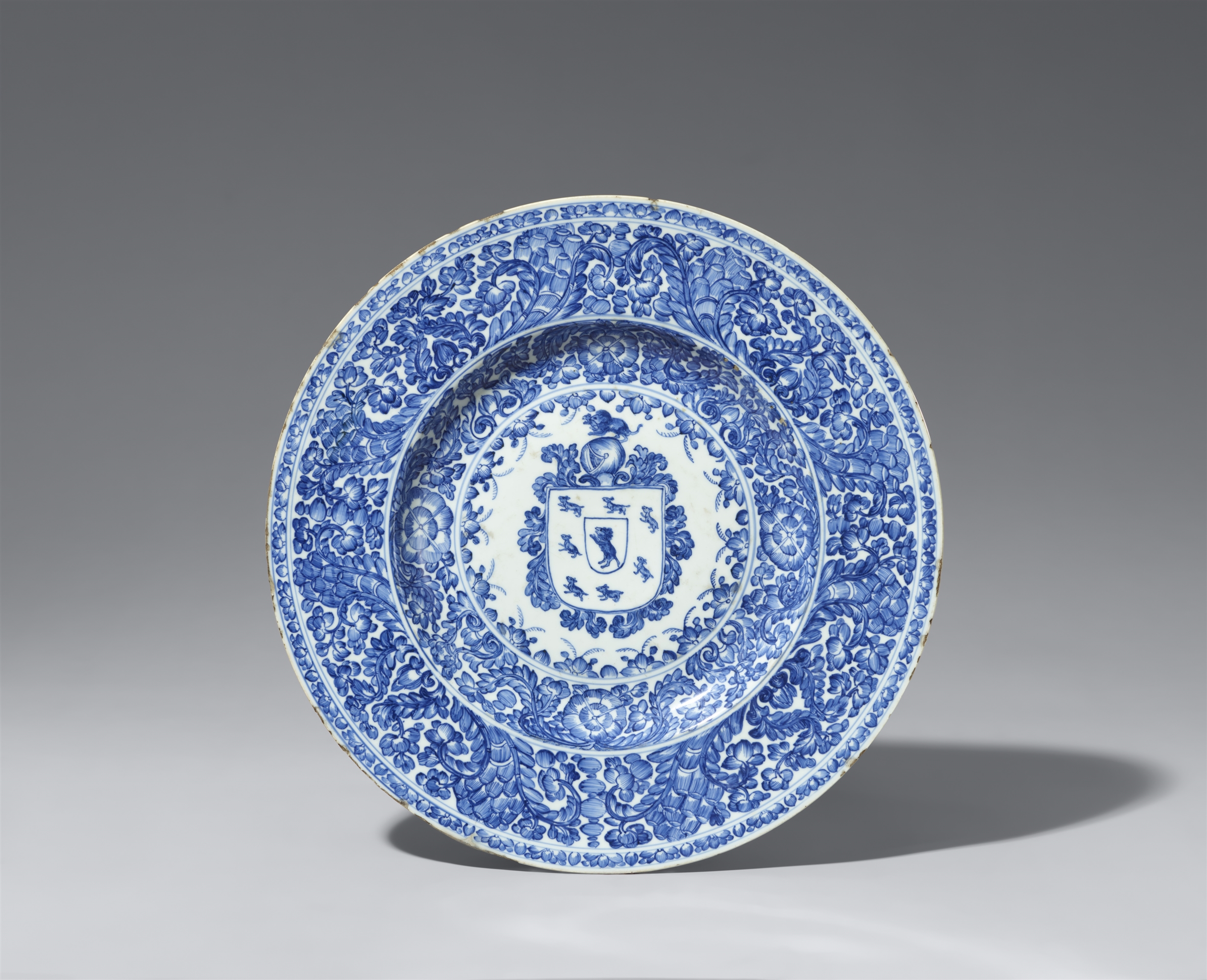 A large blue and white armorial dish with the arms of the Coelho family. Kangxi period (1661–1722), 