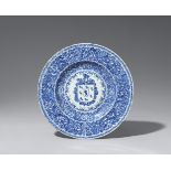 A large blue and white armorial dish with the arms of the Coelho family. Kangxi period (1661–1722), 