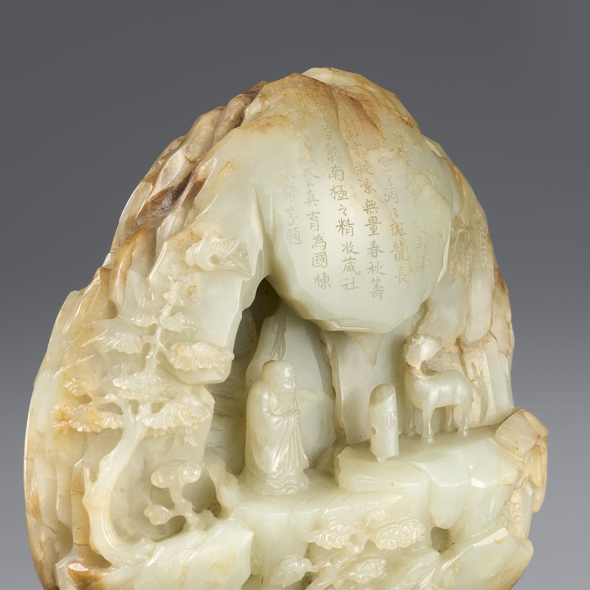 A Qing-dynasty jade carving of Shoulao with his stag. 19th century - Image 2 of 3