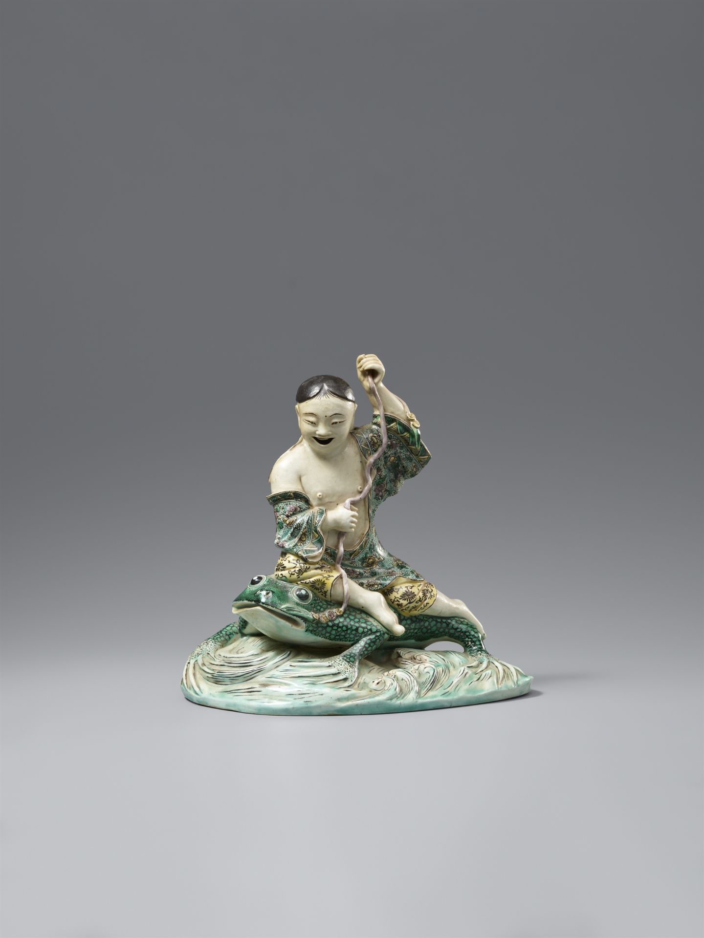 An email sur biscuit figure of Liu Hai and the three-legged wealth-toad. Kangxi period (1662–1722)