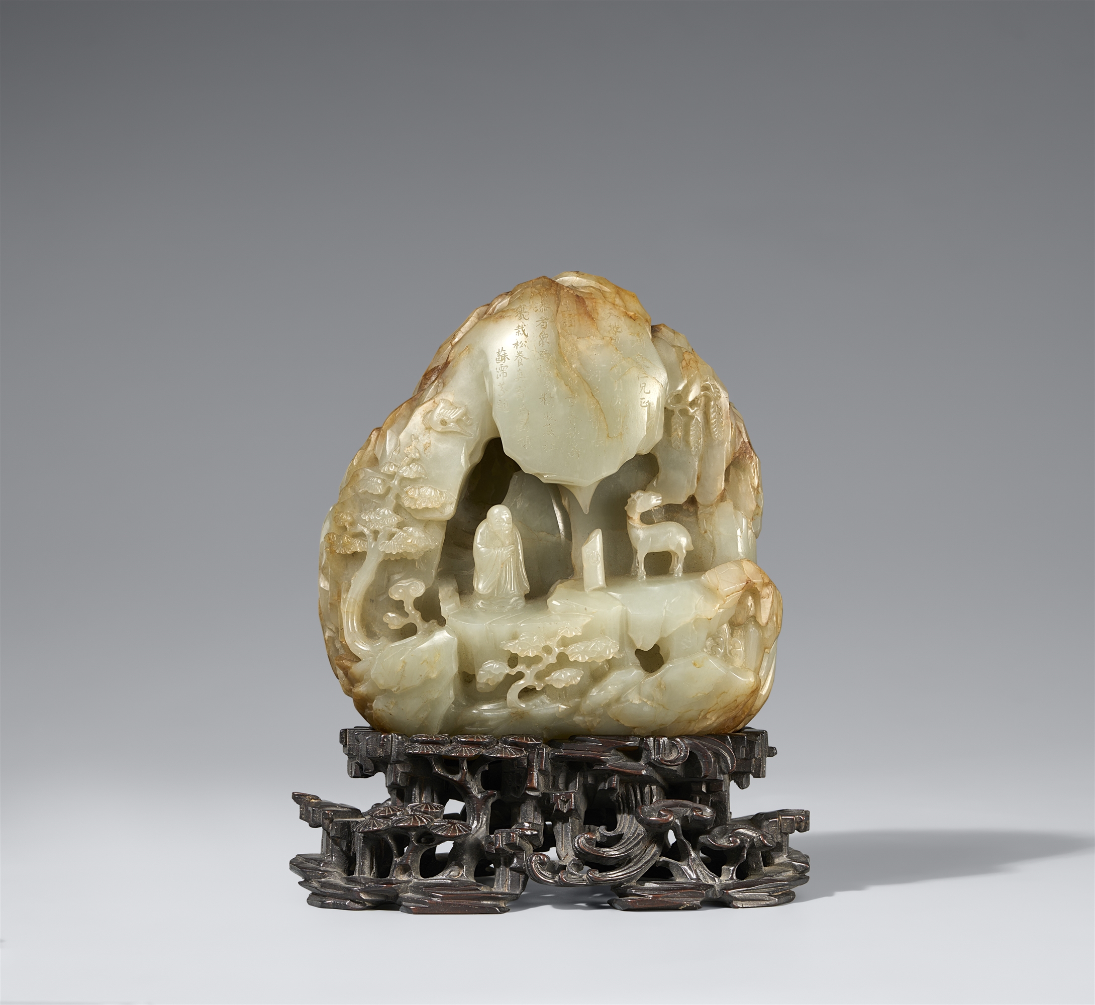 A Qing-dynasty jade carving of Shoulao with his stag. 19th century