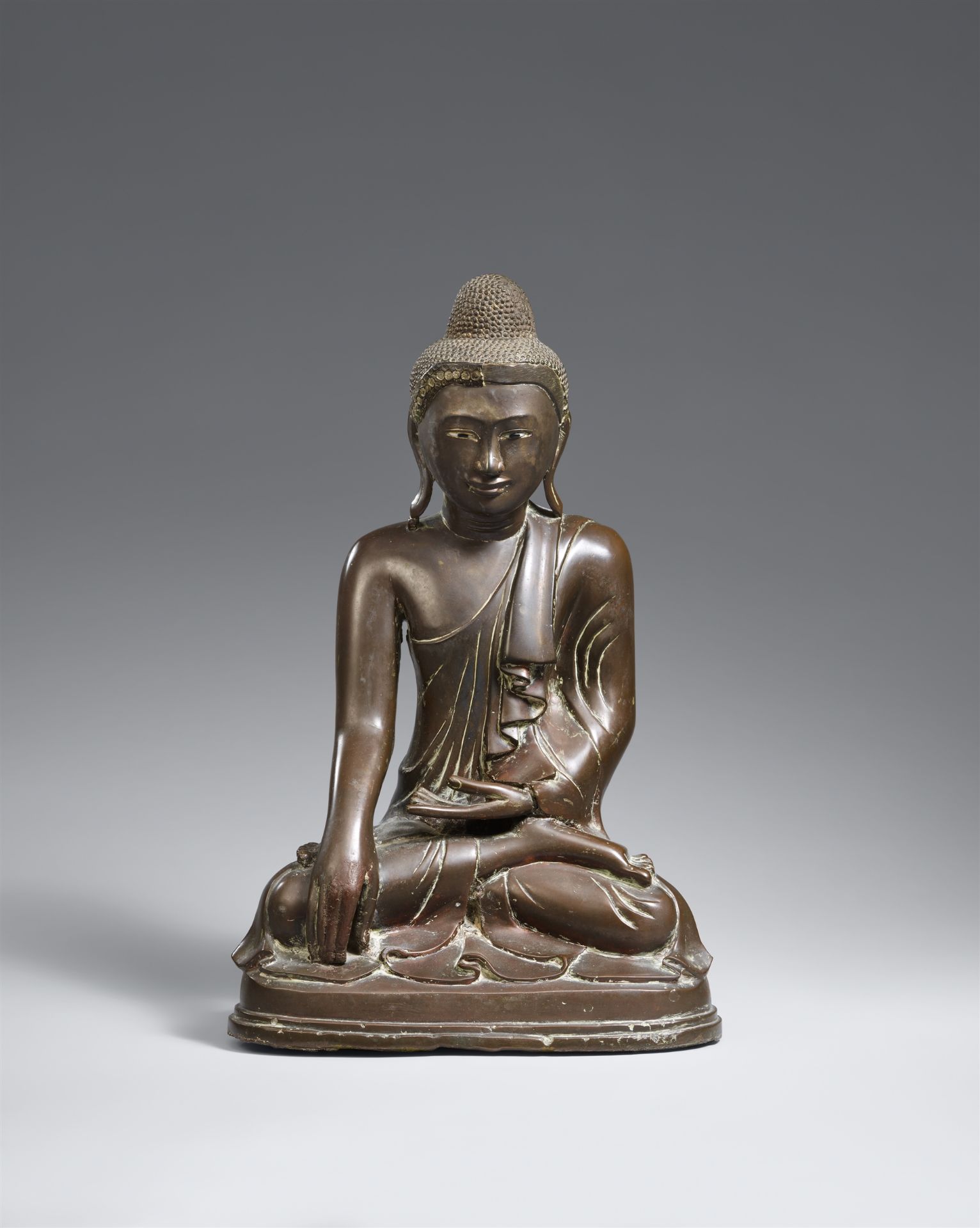 A Mandalay bronze figure of Buddha Shakyamuni. 19th/early 20th century