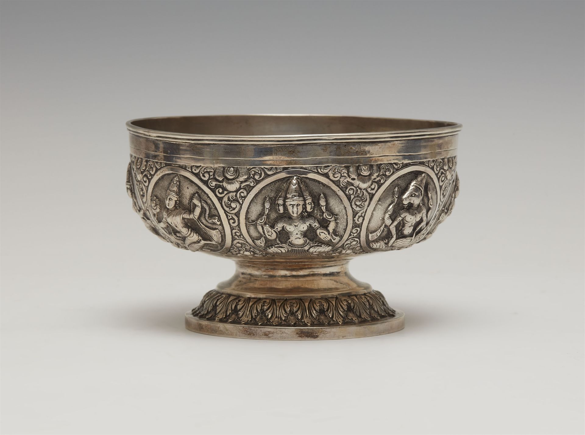 A Lucknow or Madras silver swami pattern silver pedestal rose bowl. India. Late 19th century