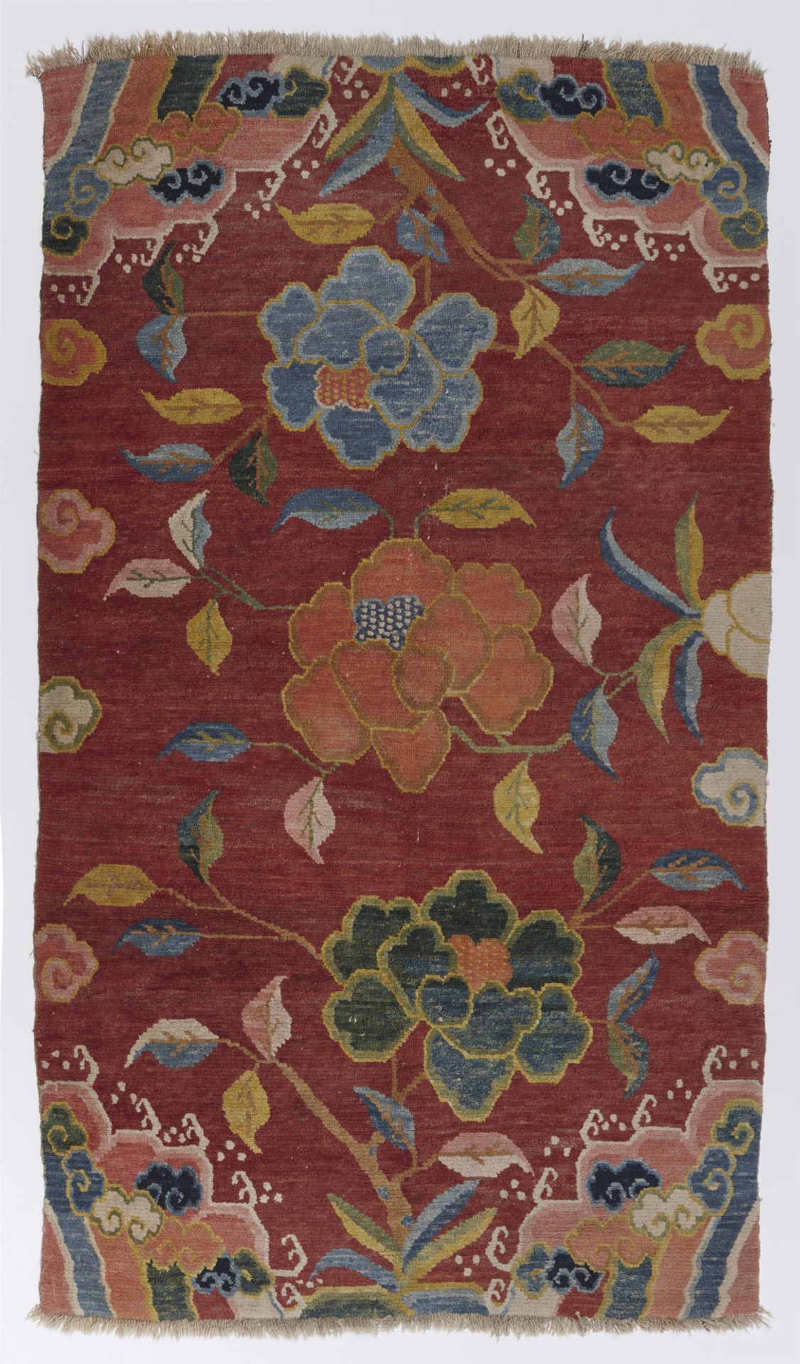 A wool Khaden rug. Tibet, around 1900