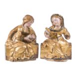 "Saint Agatha and another Saint". Pair of carved, polychromed and gilded wooden sculptures. Spanish