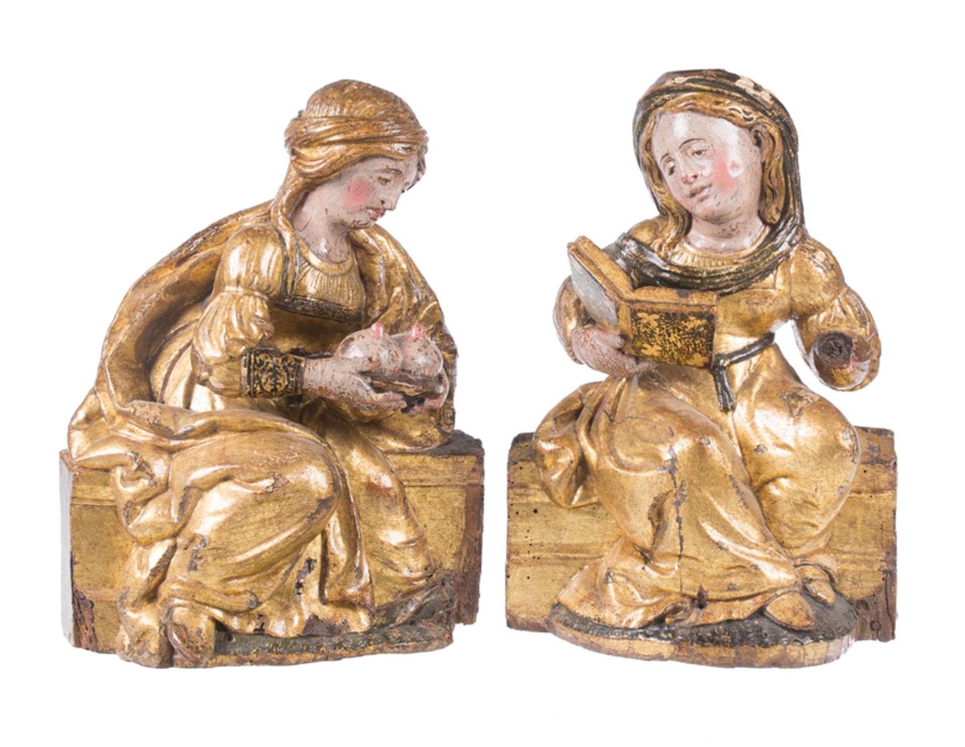 "Saint Agatha and another Saint". Pair of carved, polychromed and gilded wooden sculptures. Spanish