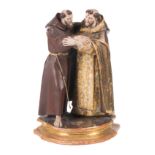"The Embrace of Saint Francis and Saint Dominic”. Polychromed and gilded terracotta sculpture. Andal