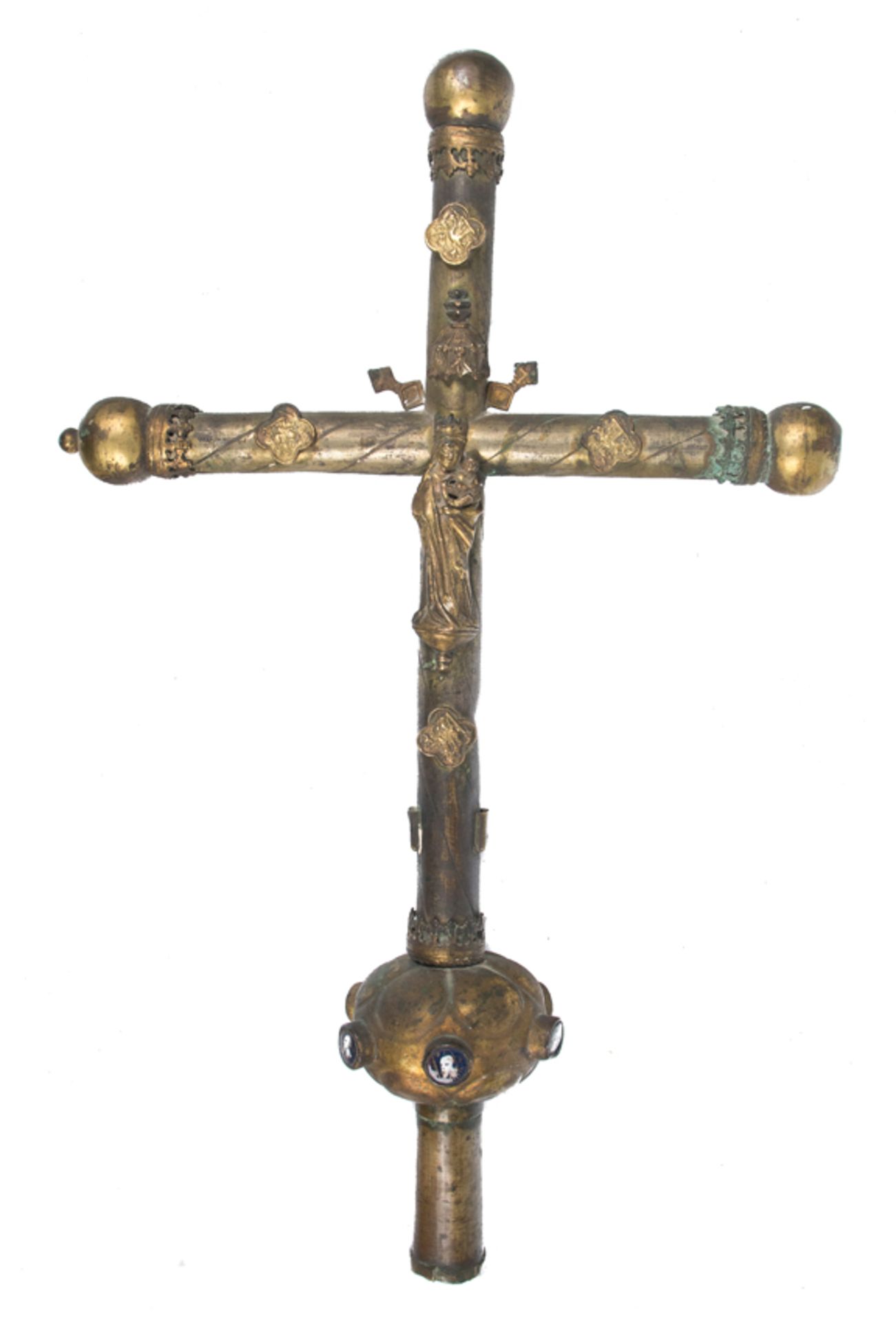 Gilded copper cross with figures and enamels affixed to it. Spain. Late Gothic. Circa 1500.