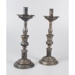 Pair of embossed and chased Spanish silver candlesticks. 16th 17th century.