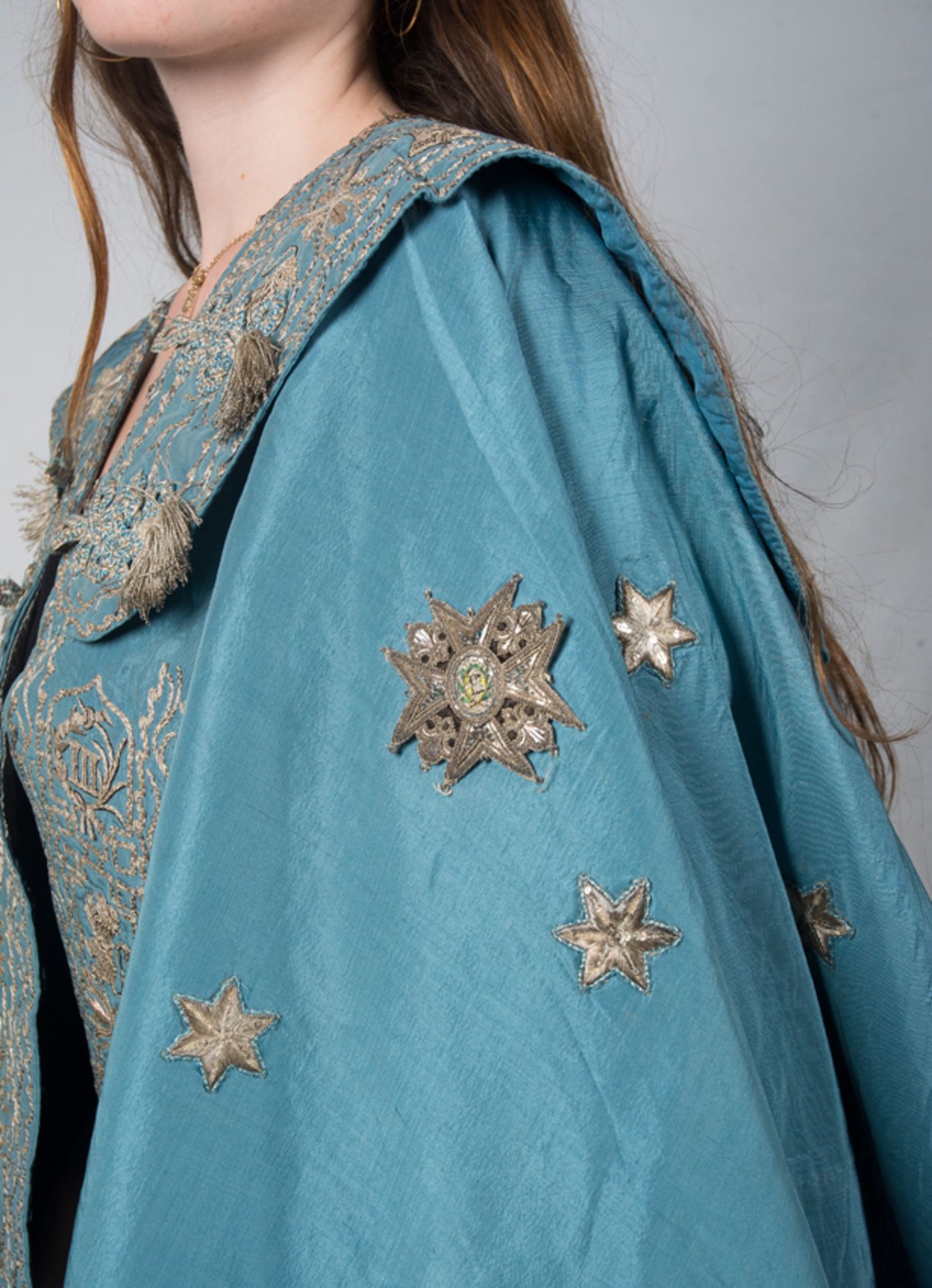 Embroidered throughout with six-pointed stars in silver and edged with the motifs of the collar of t - Image 12 of 12