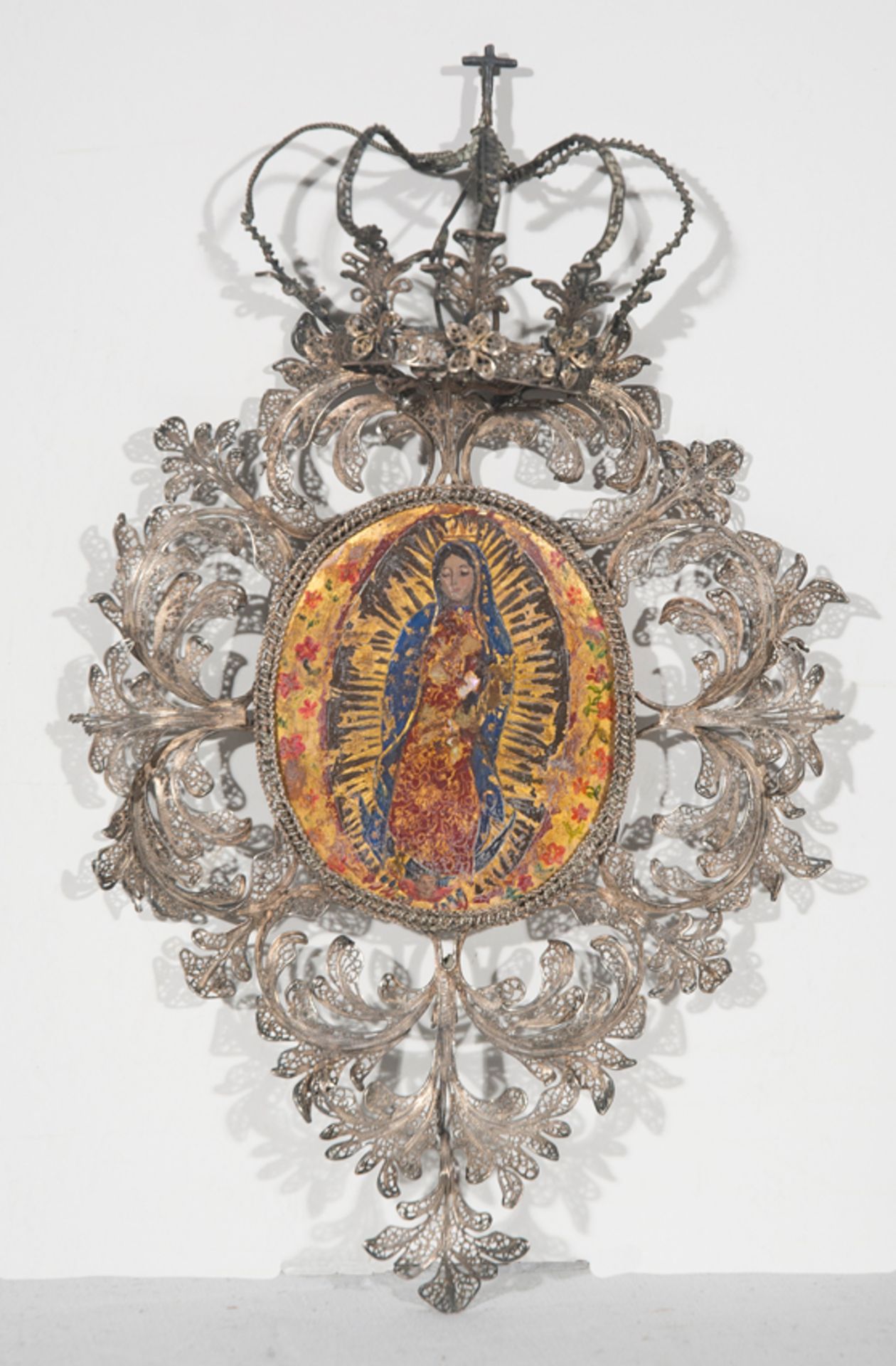 "Our Lady of Guadalupe". Oil and "enconchado" and silver filigree. Colonial School.Mexico.