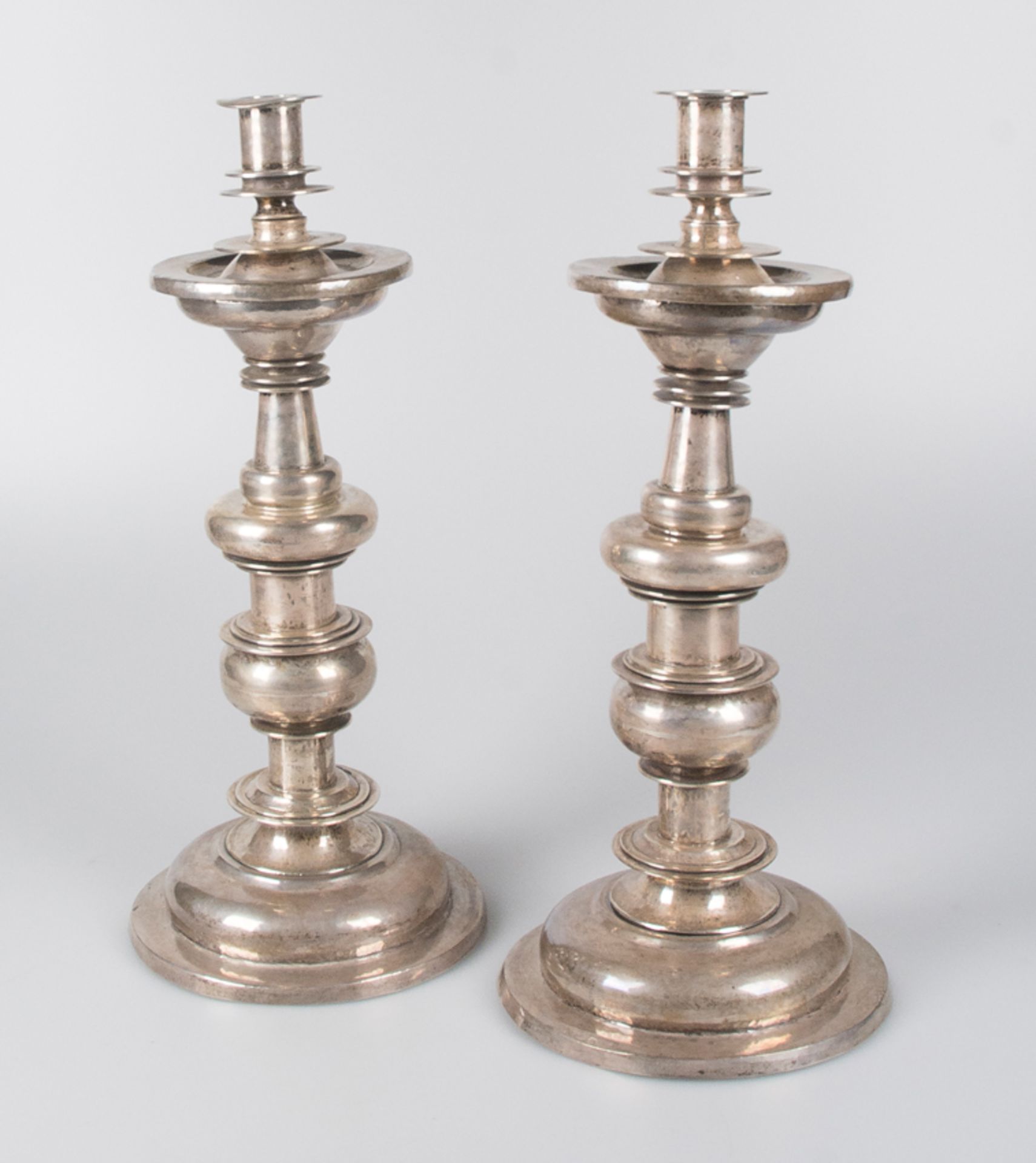 Pair of large silver candlesticks. 17th - 18th century.