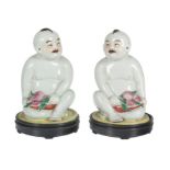 Pair of Chinese porcelain buddhas made for exportation. Famille Rose. Qing Dynasty. Qianlong period.