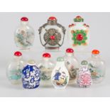 Collection of 10 glass snuff-bottles with precious stone, china, etc.20th century.