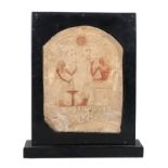 Limestone funerary stele which has been polychromed at a later date. New Kingdom of Egypt.