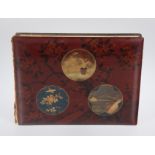 Photograph album with lacquered covers. Japan. Late 19th century.