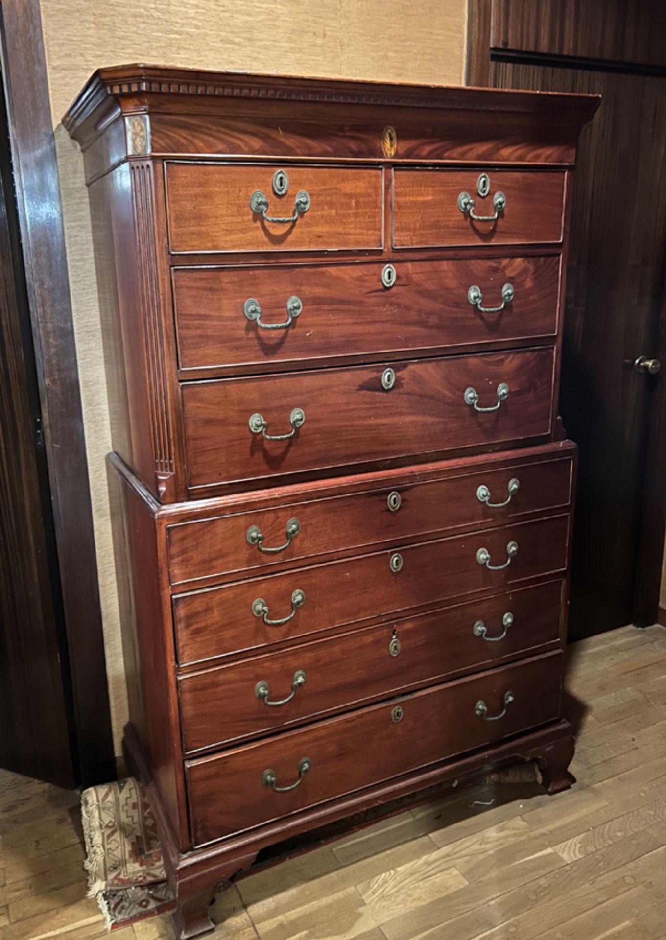 Tall-Boy veneered in walnut with iron fittings. England. Late 19th century.