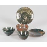Set of three bowls and two small plates in hard stone. 20th century.