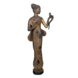 "Woman with bird". Carved, gilded and polychromed wooden sculpture.