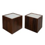 Pair of wooden bedside tables with mirror tops and wheels on the base. Circa 1970 - 1980.