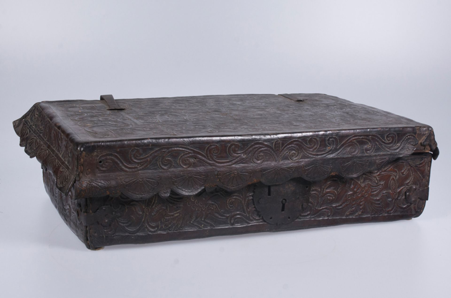 Wooden suitcase covered in embossed leather with iron fittings. Colonial. Peru. 18th century.