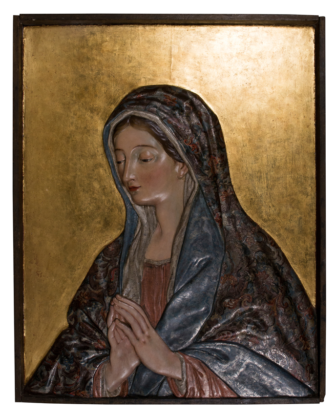 "Praying Virgin Mary". Polychromed wooden relief. Granada School. First quarter of the 18th century.
