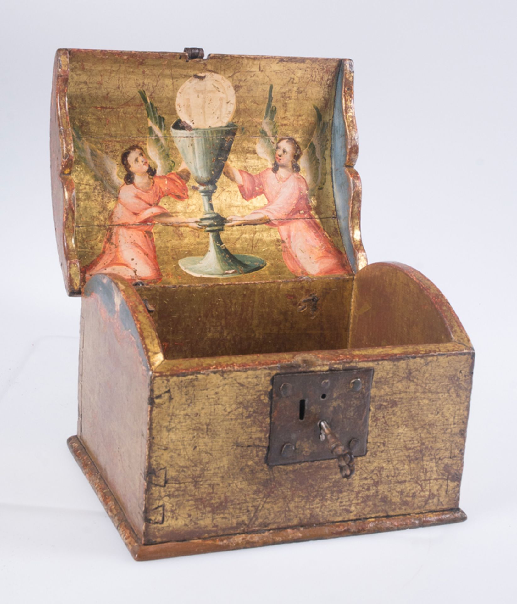 Golden and polychrome carved wood Eucharistic chest with iron fittings.Lluçanès.Catalonia. 16th cent