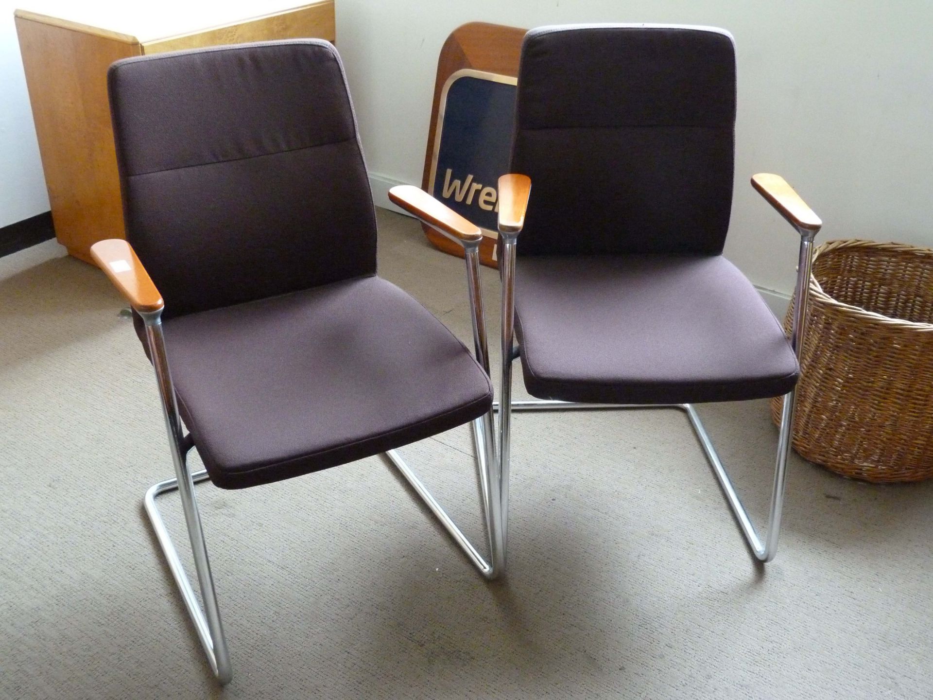 2 Brown chrome framed armchairs
