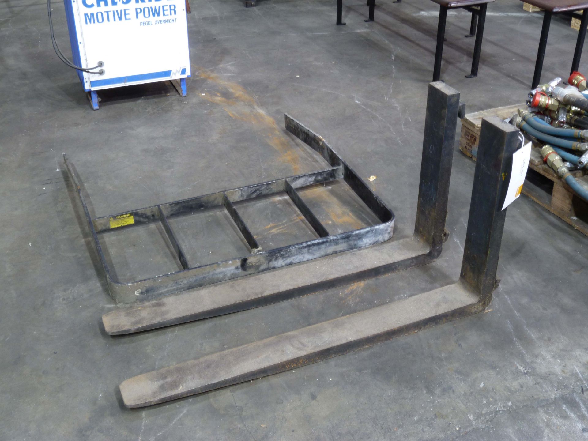 Pair of long Fork lift forks with a mast guard