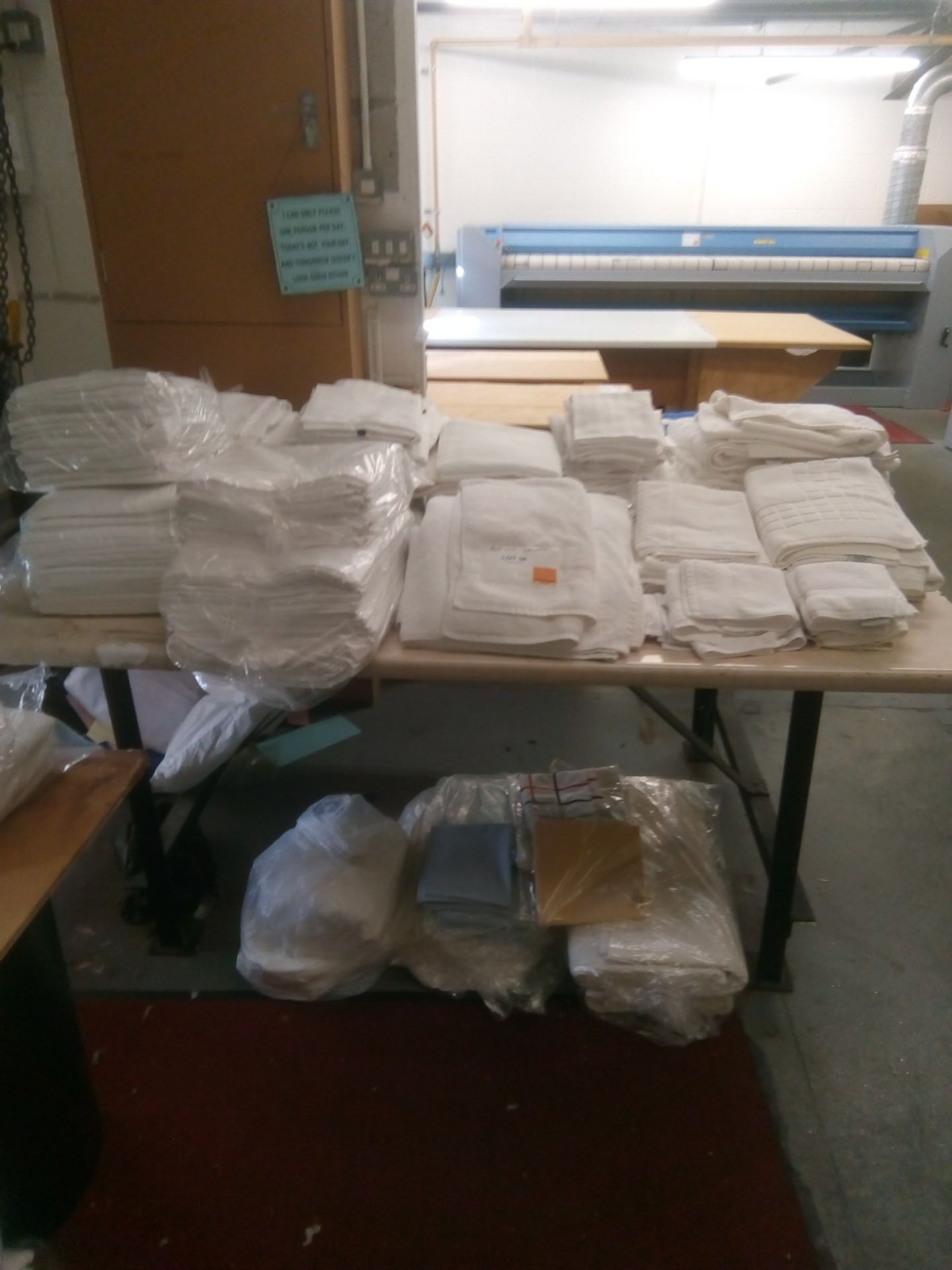 Quantity of new and unused bed linen and towels.