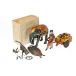 3 Blechspielzeuge, Teile von Lehmann Maikäfer, Blech-Elefant ”Jumbo” und Gepäckkarre mit Figur (