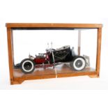 Ford-Mobil ”Badman”, in Glasvitrine, tw besch. und lose, 54,5 x 33,5 x 30,5