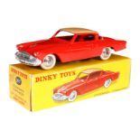 Dinky Toys Studebaker 24 Y, rot/creme, LS und Alterungsspuren, im Karton, Z 2