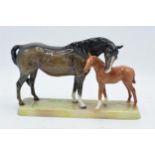 Beswick Mare and Foal on base: Beswick brown mare with Chestnut foal on ceramic grass base 1811.