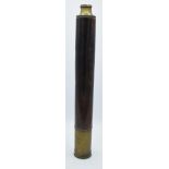 A 19th Century leather covered extending brass telescope by McKenzie of London. 50cm long when