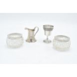 A collection of silver items to include a pair of silver topped salts (London 1900), a miniature