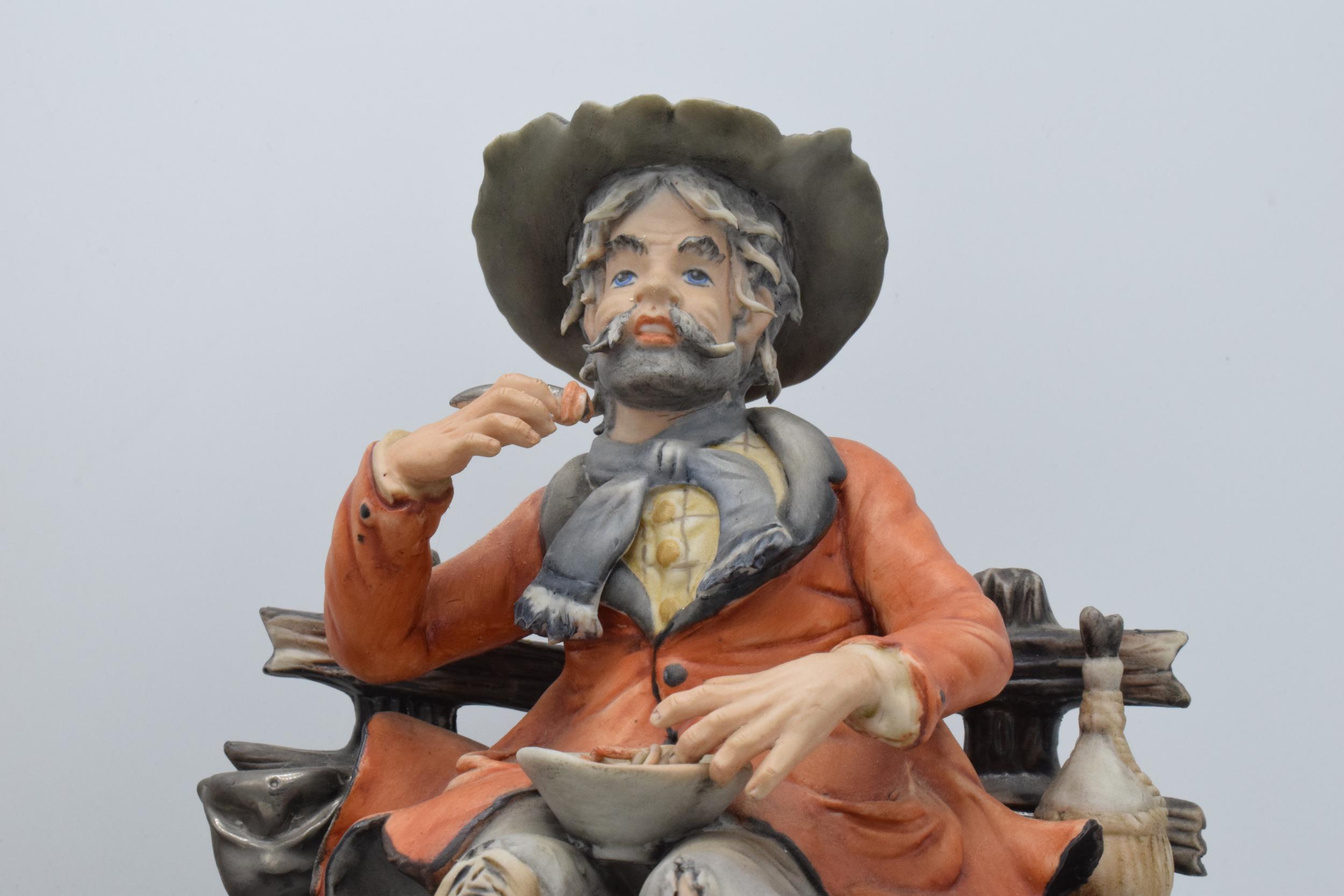 A pair of Capo Di Monte figures to include a Sartou man eating whilst seated on a bench and a - Image 4 of 7