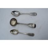 A collection of silver to include a Victorian sifter spoon Edinburgh, a tea spoon and a dessert