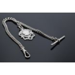 A hallmarked silver Albert chain and fob with T bar. 33.2 grams. 26.5cm long. Each link with