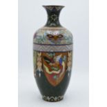 A large cloisonné vase with scenes resembling cock fighting. 31cm tall. Generally in good
