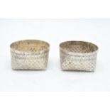 A pair of foreign silver bon bon dishes with patchwork decoration. Tested as low grade silver. 105.4